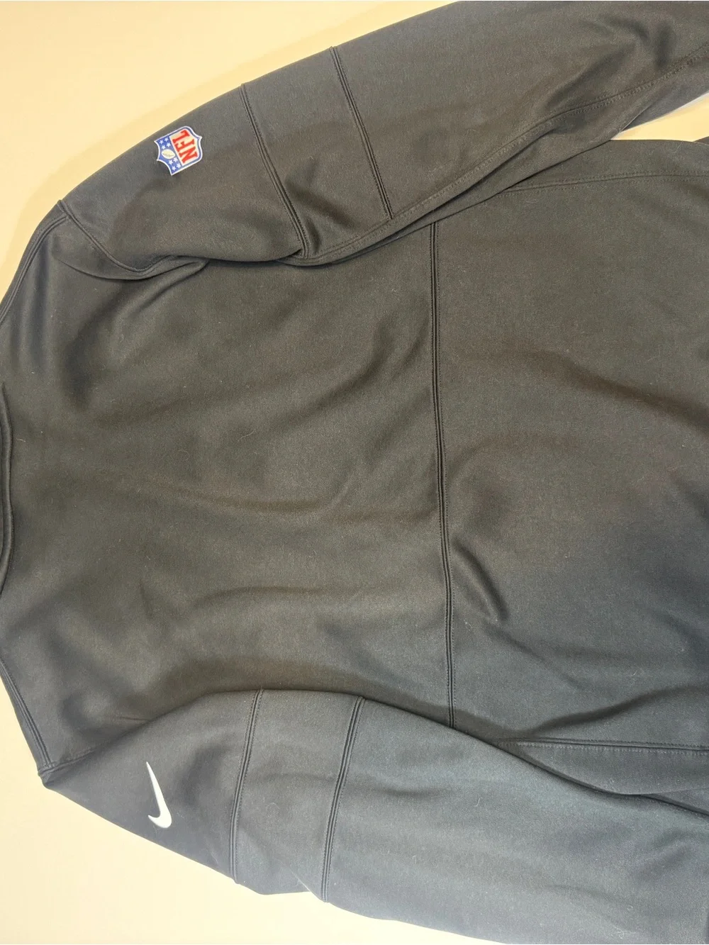 Crucial Catch Black Pullover with Multicolor Stripe Patch